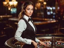bintang11 slot live-dealer studio with HD cameras and professional dealer at blackjack table