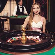 Live dealer studio at bintang11 slot with HD cameras capturing Andar Bahar card shuffle and deal